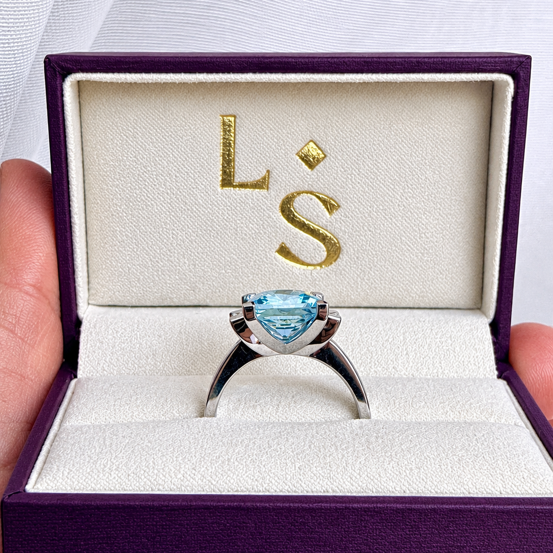 Princess Cut Blue Topaz and Diamond Ring
