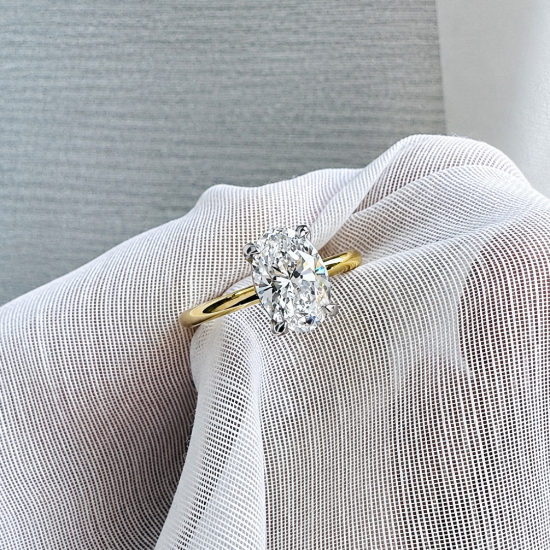 Oval Diamond Solitaire with Hidden Halo