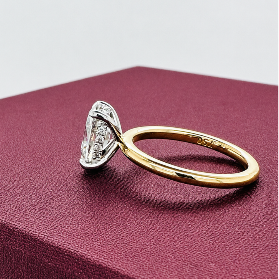 Oval Diamond Solitaire with Hidden Halo