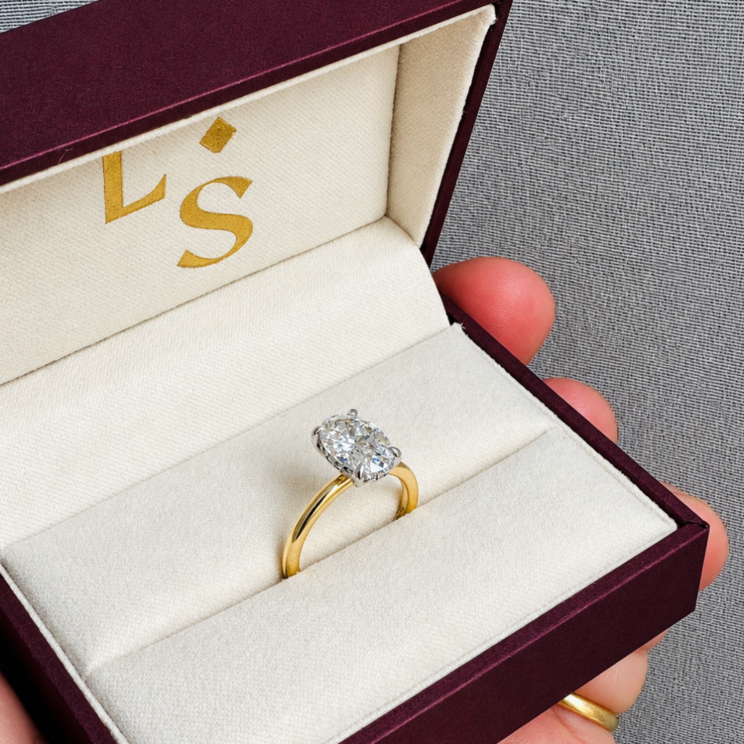 Oval Diamond Solitaire with Hidden Halo